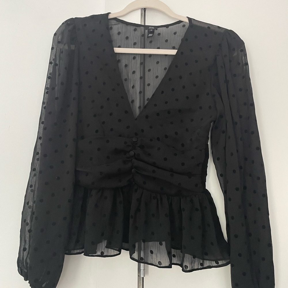 River Island black mesh polka dot long sleeve peplum top. Size UK 12 US 8 EU 40